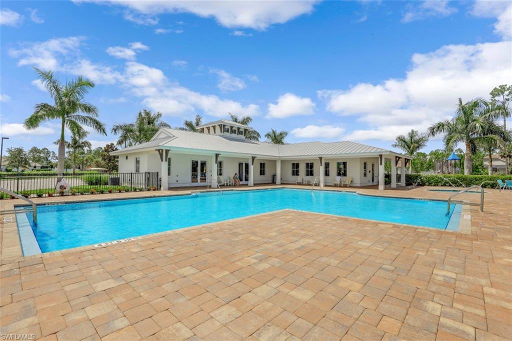 3528 Pilot Circle Naples, FL 34120 - Photo 42 of 46 a view of house with swimming pool and yard