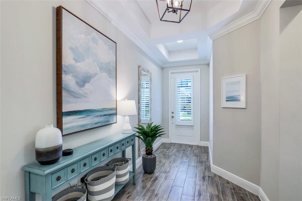 3528 Pilot Circle Naples, FL 34120 - Photo 6 of 46 a view of hall way with furniture and wooden floor