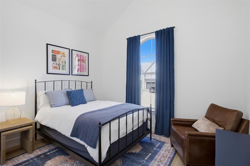 6033 Strada Cove Fort Worth, TX 76123 - Photo 23 of 35 a bedroom with a bed and a window