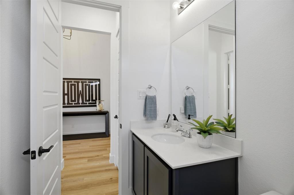 6033 Strada Cove Fort Worth, TX 76123 - Photo 25 of 35 a bathroom with a sink and a mirror