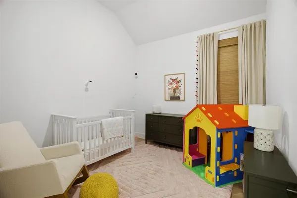 a bedroom with furniture and a bathtub