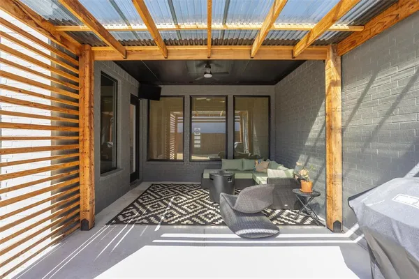 a view of a porch with furniture