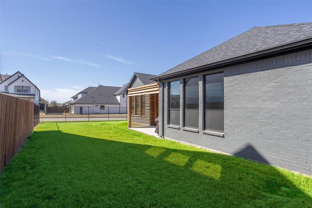 6033 Strada Cove Fort Worth, TX 76123 - Photo 35 of 35 a view of outdoor space yard and porch