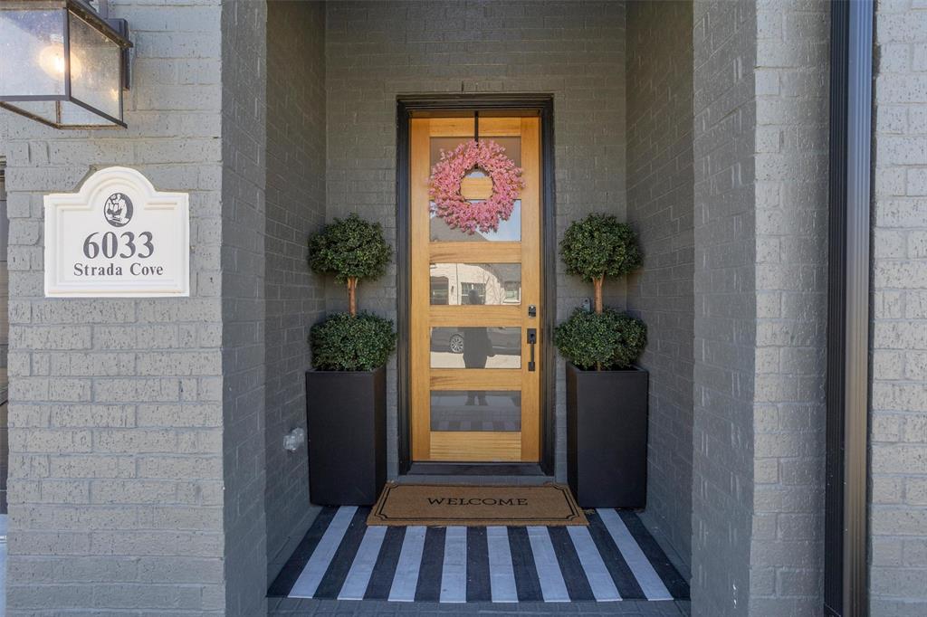 6033 Strada Cove Fort Worth, TX 76123 - Photo 5 of 35 a view of a hallway view with wooden floor and staircase