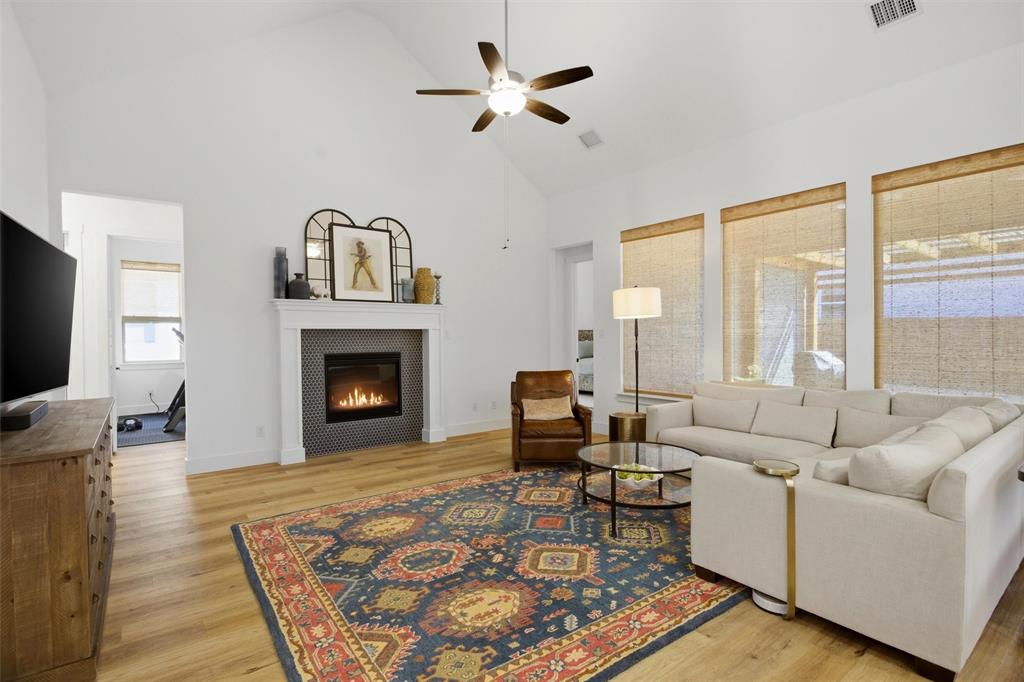 6033 Strada Cove Fort Worth, TX 76123 - Photo 7 of 35 a living room with furniture fireplace and window