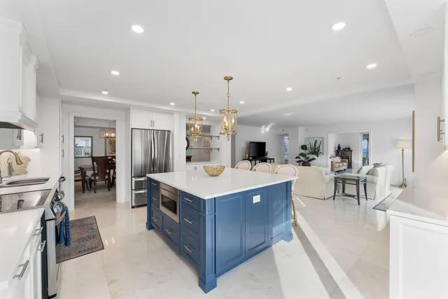 a kitchen with a stove and a refrigerator