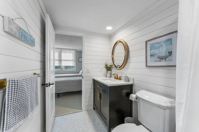 a view of a lake with chairs