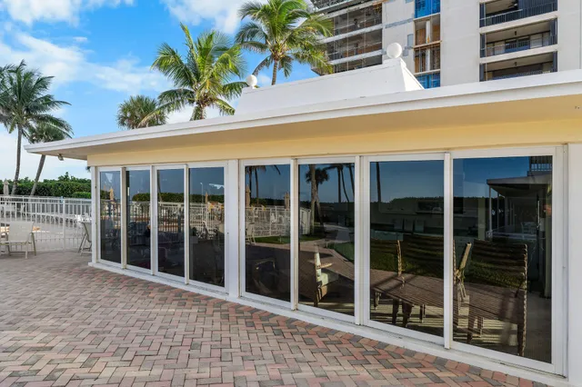 swimming pool with outdoor seating and yard