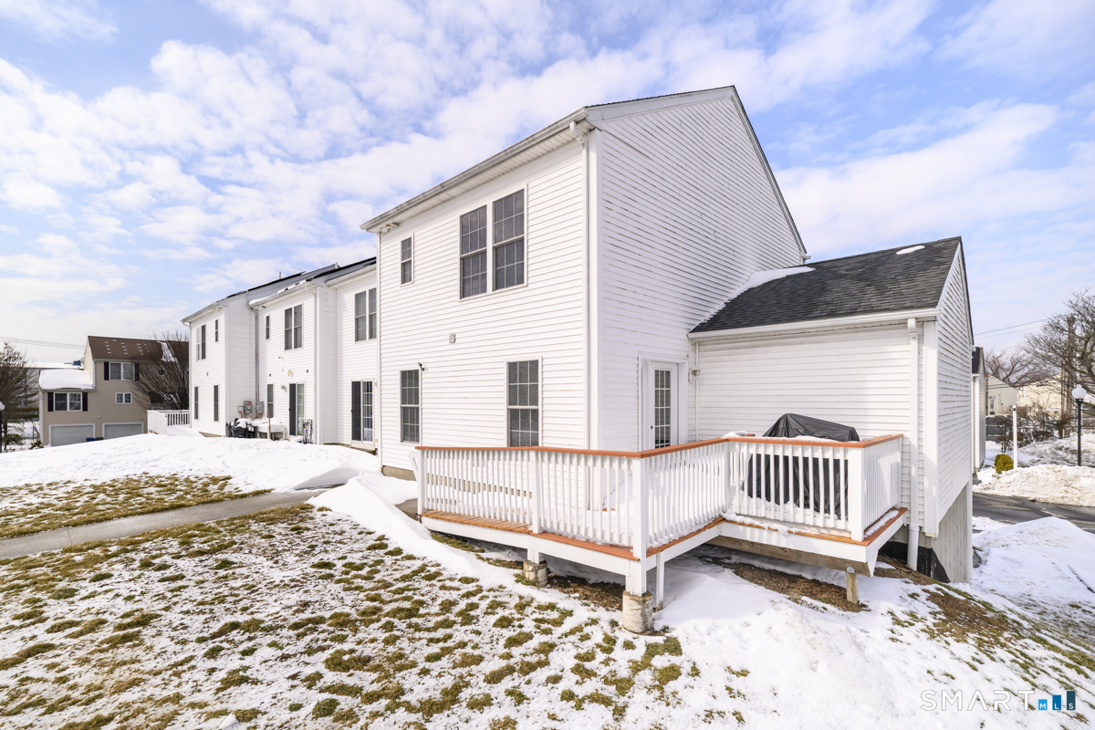800 Seaview Avenue, Unit 8001 Bridgeport, CT 06607 - Photo 23 of 25 a front view of a house with a yard