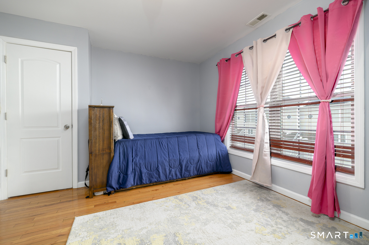 800 Seaview Avenue, Unit 8001 Bridgeport, CT 06607 - Photo 4 of 25 a view of a room with wooden floor and window