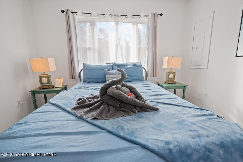 1345 Highway 715 Stroudsburg, PA 18360 - Photo 12 of 35 a bed room with a bed and a chair