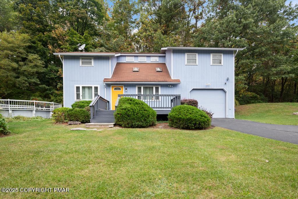 1345 Highway 715 Stroudsburg, PA 18360 - Photo 2 of 35 a front view of a house with yard and green space