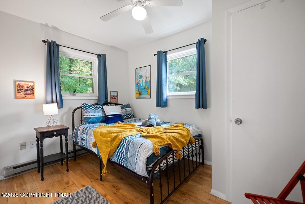 1345 Highway 715 Stroudsburg, PA 18360 - Photo 25 of 35 a bedroom with a bed table chair and a window