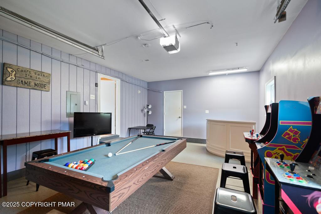 1345 Highway 715 Stroudsburg, PA 18360 - Photo 29 of 35 a living room with furniture a flat screen tv and a window