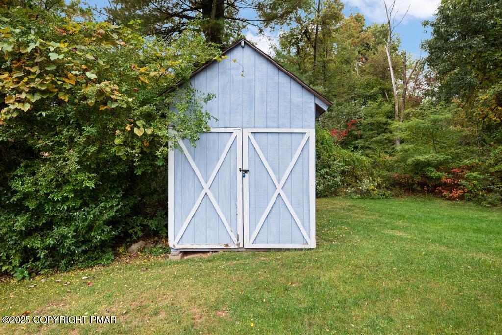 1345 Highway 715 Stroudsburg, PA 18360 - Photo 32 of 35 a view of barn with a small yard and more potted plants