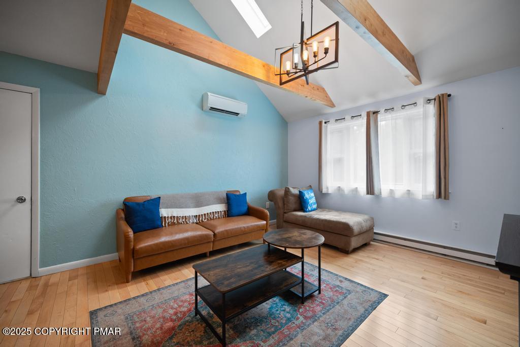 1345 Highway 715 Stroudsburg, PA 18360 - Photo 6 of 35 a living room with furniture a rug and a window
