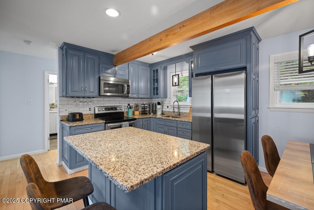 1345 Highway 715 Stroudsburg, PA 18360 - Photo 7 of 35 a kitchen with stainless steel appliances granite countertop a refrigerator a stove top oven a sink and dishwasher