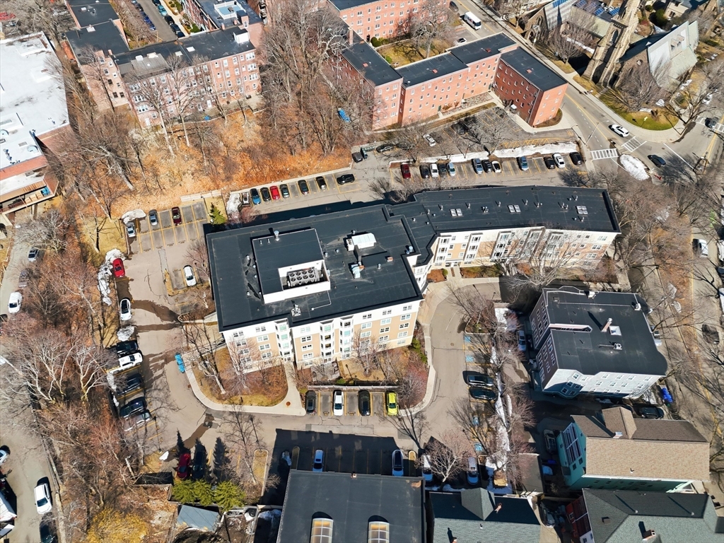2-14 St Paul Street, Unit 403 Brookline, MA 02446 - Photo 15 of 16 an aerial view of a building with street