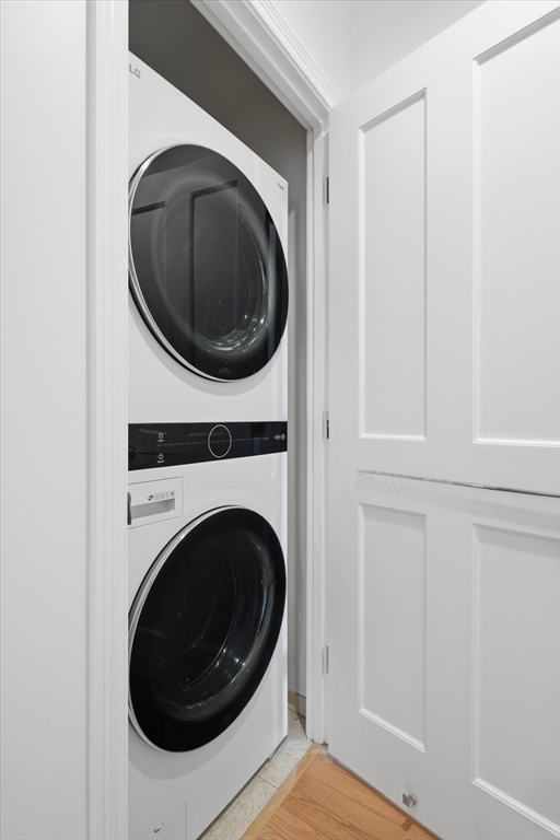 2-14 St Paul Street, Unit 403 Brookline, MA 02446 - Photo 8 of 16 a view of a hallway with washer and dryer