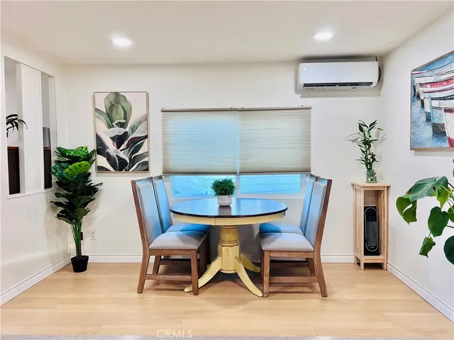 a bedroom with a bed and a cabinets
