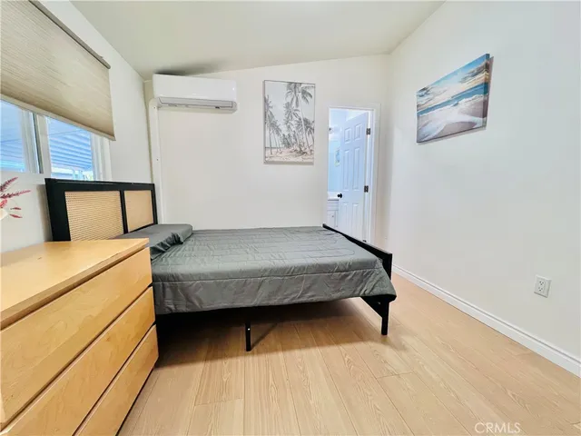 a bathroom with a toilet sink and shower