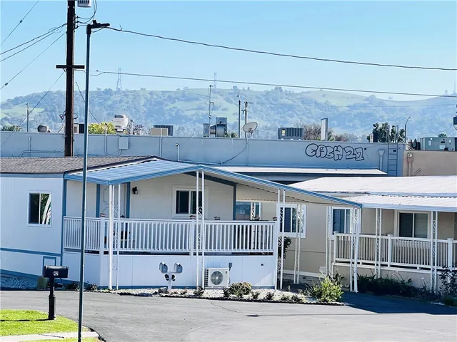 a view of a house with swimming pool