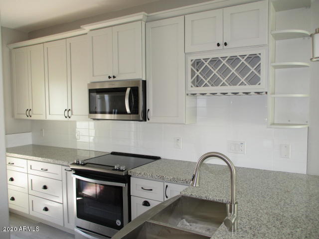 614 West Harwell Rd. Phoenix, AZ 85041 - Photo 3 of 11 Bethany B Kitchen 2