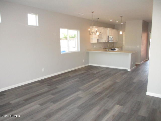 614 West Harwell Rd. Phoenix, AZ 85041 - Photo 5 of 11 Bethany B Great room 1
