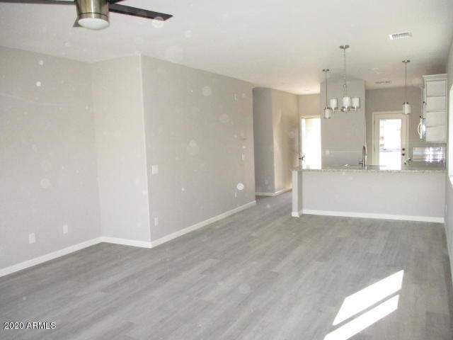614 West Harwell Rd. Phoenix, AZ 85041 - Photo 6 of 11 Bethany B Great Room 2