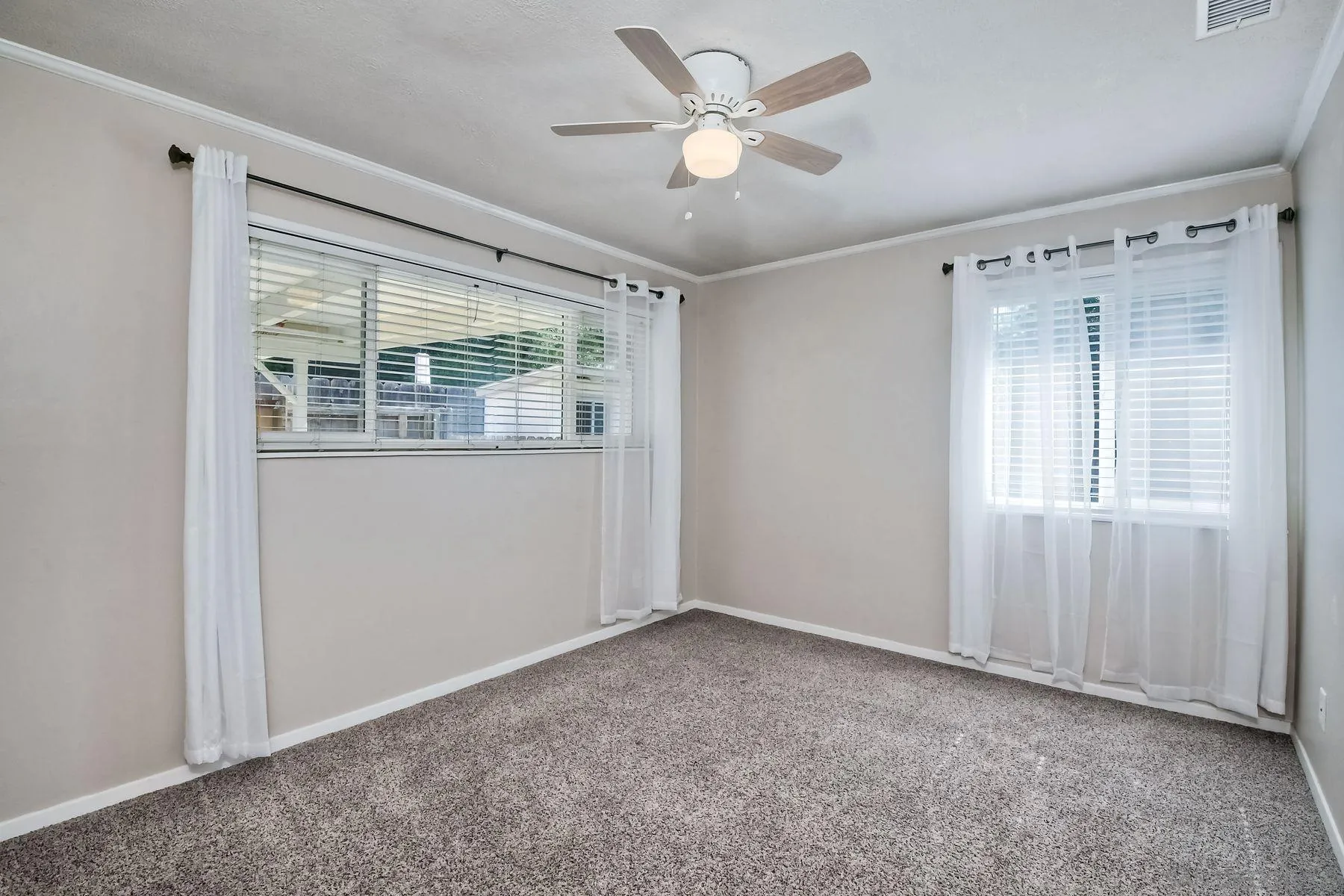 14135 Powers Road Poway, CA 92064 - Photo 24 of 35 a view of an empty room with a window
