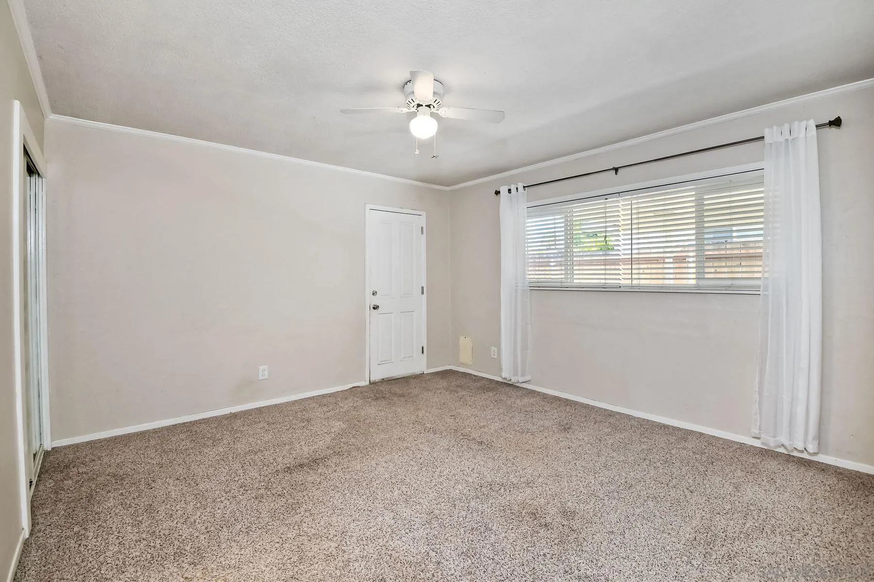 14135 Powers Road Poway, CA 92064 - Photo 25 of 35 a view of an empty room with a window