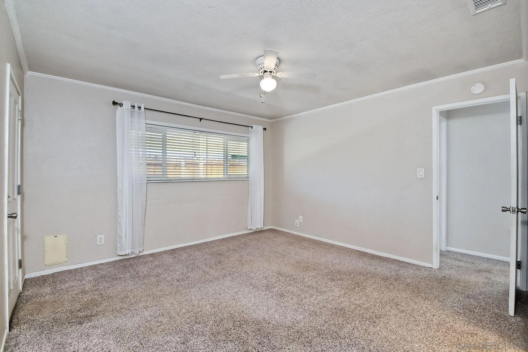 14135 Powers Road Poway, CA 92064 - Photo 27 of 35 a view of an empty room with a window