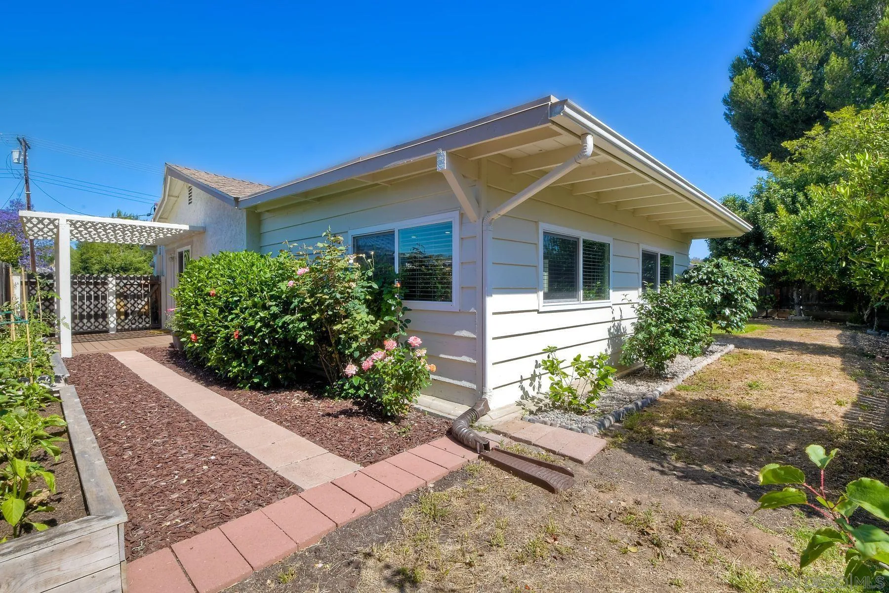 14135 Powers Road Poway, CA 92064 - Photo 32 of 35 a view of a house with a yard