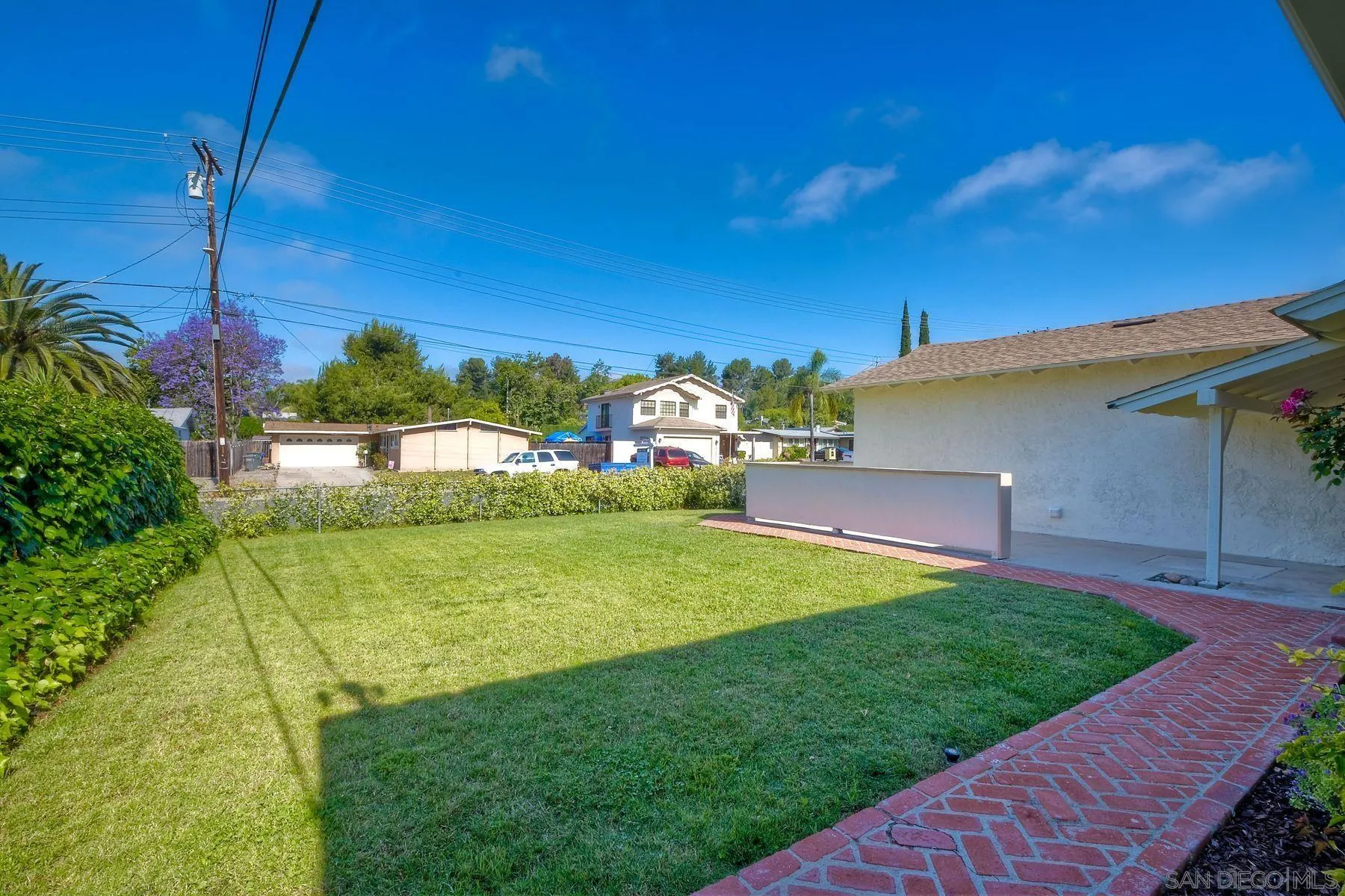 14135 Powers Road Poway, CA 92064 - Photo 4 of 35 a view of an house with backyard outdoor seating and kitchen