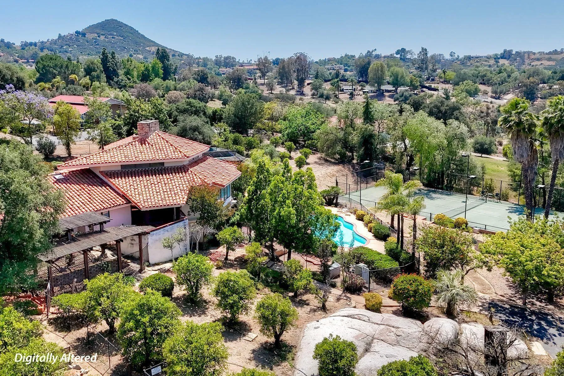 30458 Cool Valley Highlands Road Valley Center, CA 92082 - Photo 16 of 47 an aerial view of a house with a garden