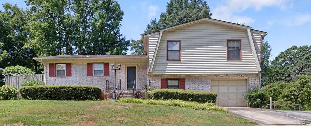 2323 Emerald Falls Drive Decatur, GA 30035 - Photo 1 of 1 a front view of a house with a yard