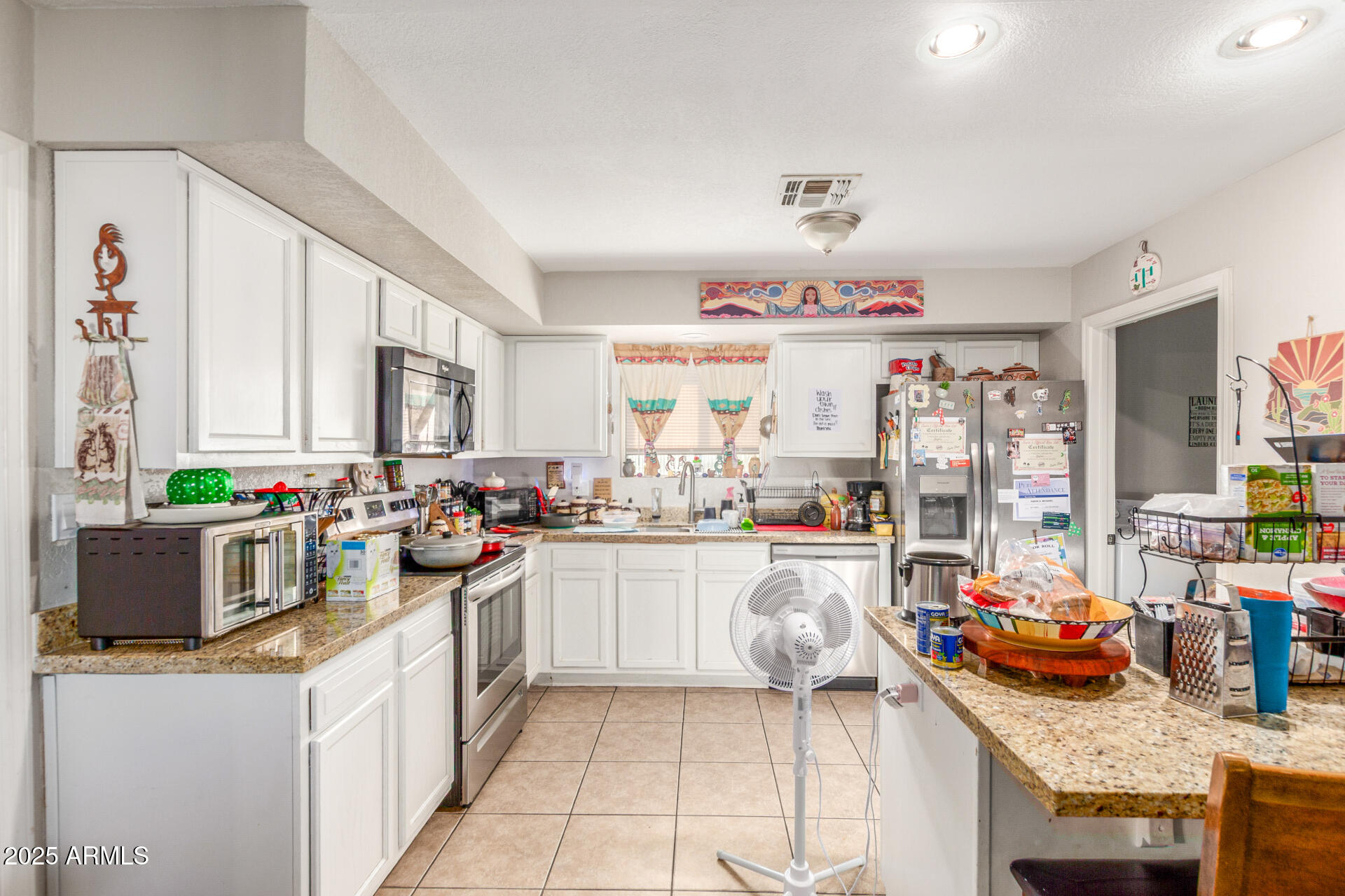 3654 West Shangri-la Road Phoenix, AZ 85029 - Photo 11 of 34 a kitchen with granite countertop lots of counter top space