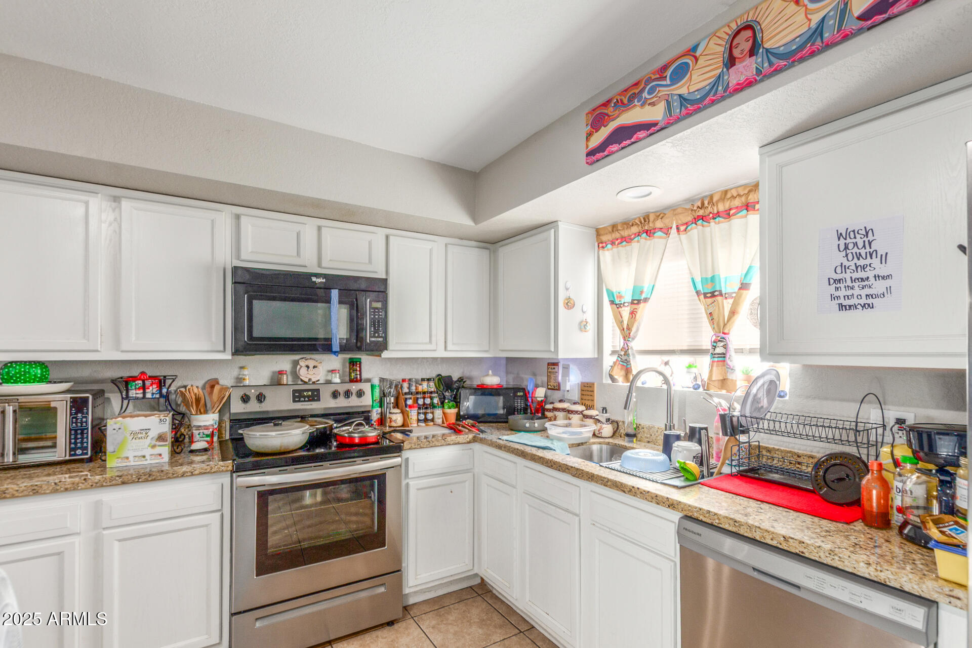 3654 West Shangri-la Road Phoenix, AZ 85029 - Photo 14 of 34 a kitchen with granite countertop lots of appliances and cabinets