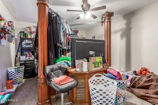 a living room with furniture and a window