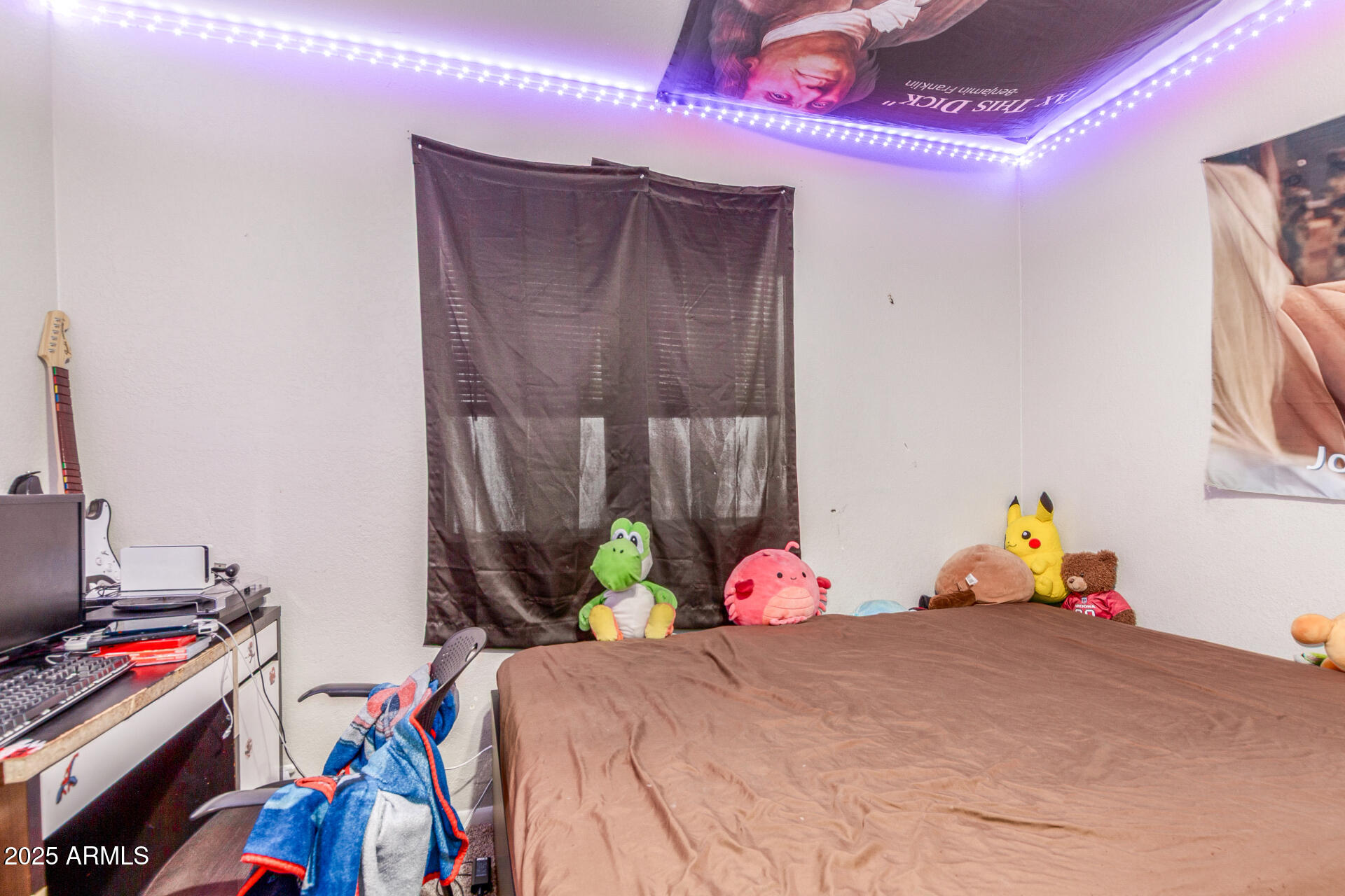 3654 West Shangri-la Road Phoenix, AZ 85029 - Photo 25 of 34 a bedroom with a bed and a window