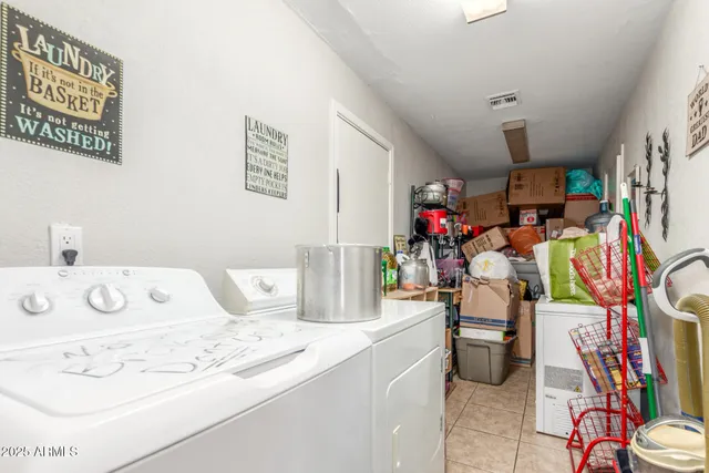 a bedroom with a bed and a bookshelf