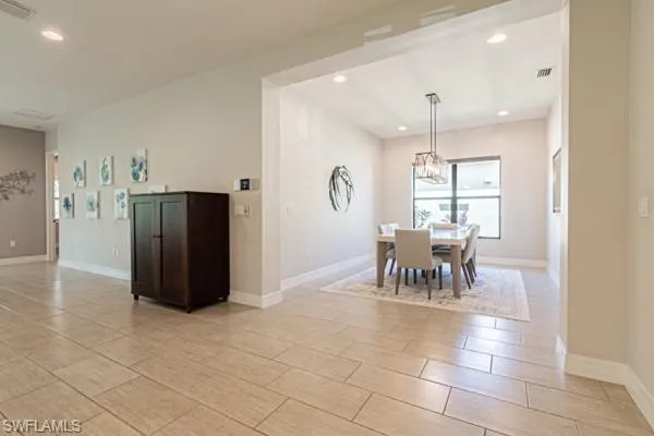 a view of a dining room with furniture