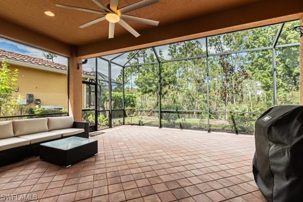 3471 Pacific Drive Naples, FL 34119 - Photo 24 of 29 a large bedroom with a large bed and a large window