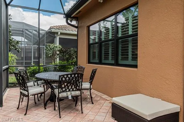 a view of backyard with a garden and tree