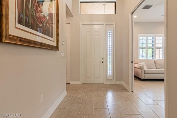 3471 Pacific Drive Naples, FL 34119 - Photo 3 of 29 a view of a livingroom with furniture and windows