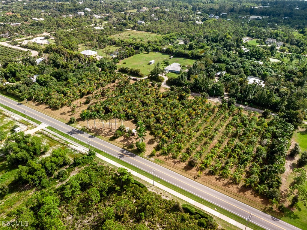 12549 Tiffany Road Bokeelia, FL 33922 - Photo 4 of 17 a view of a garden with an empty room