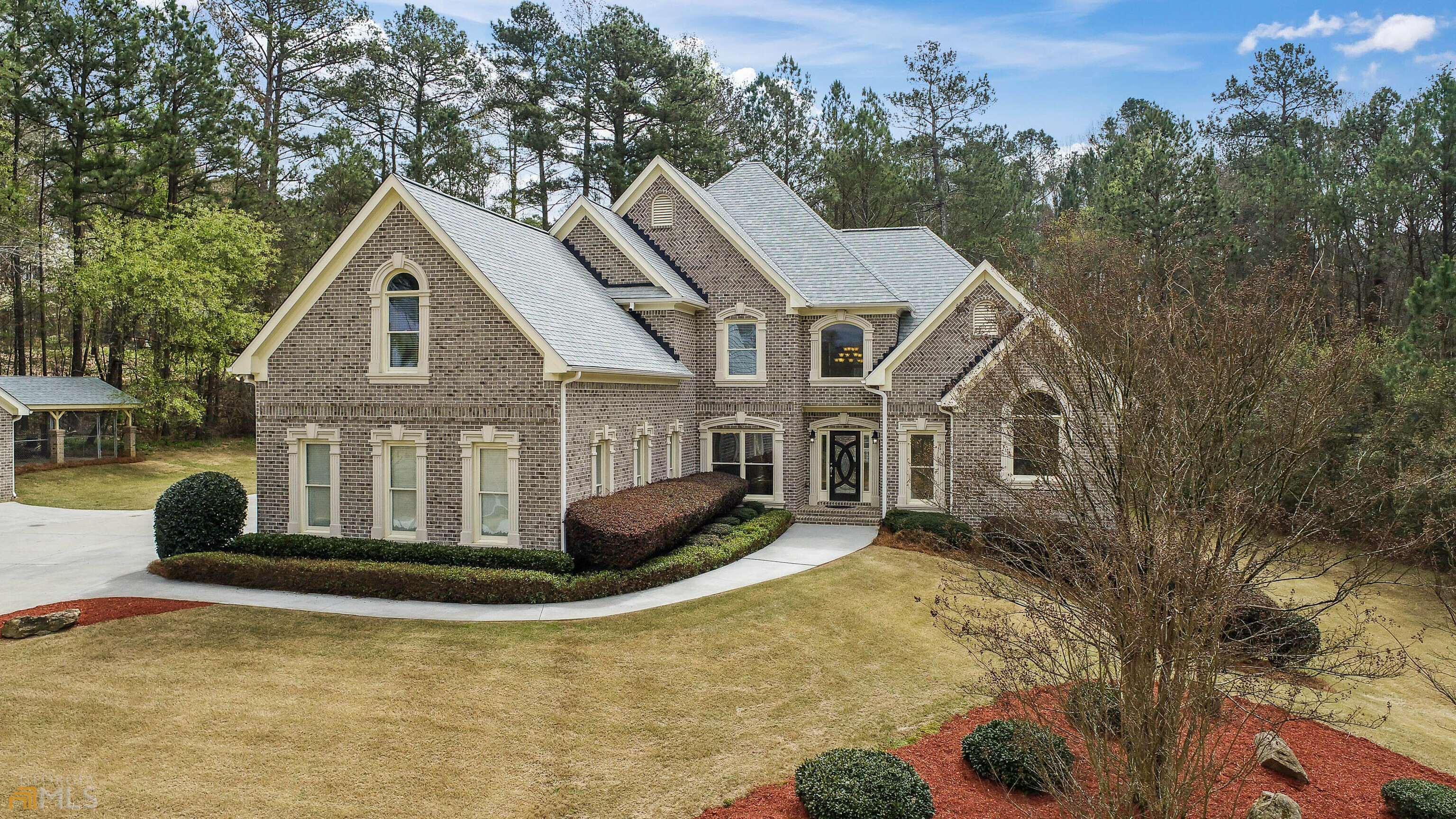 5326 Alexanders Lake Road Southwest Stockbridge, GA 30281 - Photo 1 of 1 a view of a house with a yard