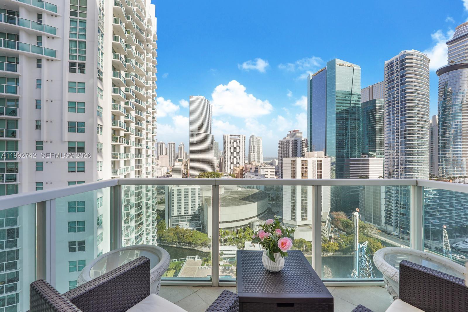 41 Southeast 5th Street, Unit 1505 Miami, FL 33131 - Photo 15 of 16 a view of a city from a balcony