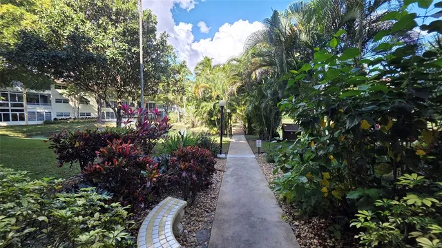a view of a lake with a building in the background