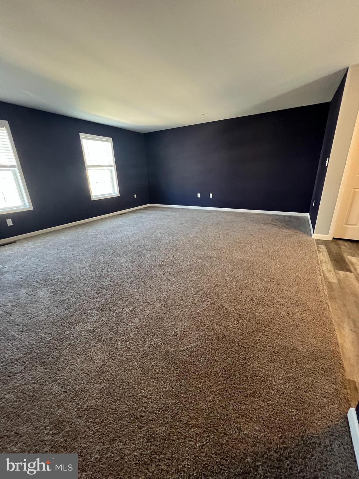 2317 Bartlett Road Harrisburg, PA 17110 - Photo 13 of 59 wooden floor in an empty room with a window